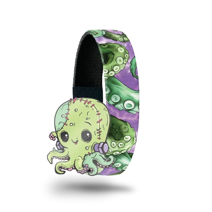 Outside is purple and has green octopus tentacles all over. Comes with a matching green octopus that has stitches on its head and bolts in its neck, like Frankenstein.