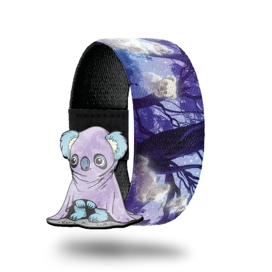 Outside is a purple and black dark forest at night with the moon shining. Ghost koala are floating all over. Comes with a  pin of a blue Koala dressed as a purple ghost.