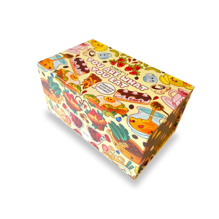 Showing the box in yellow with cartoon foods all over.